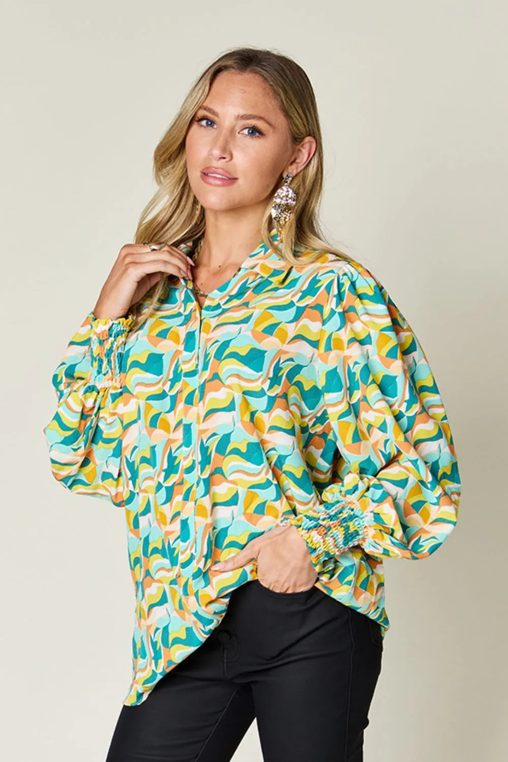 Women's oversized retro print blouse with smocked cuffs in teal yellow orange